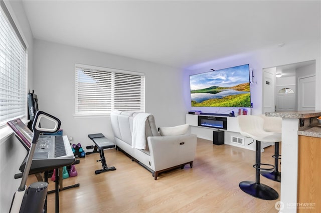 living area with light wood-style flooring