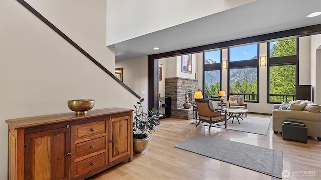 510 Dempsey Rd, Leavenworth, WA 98826 - foyer entrance with light wood-style flooring, a stone fireplace, and recessed lighting