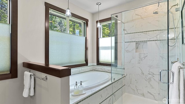 510 Dempsey Rd, Leavenworth, WA 98826 - bathroom featuring a bath and a marble finish shower