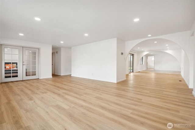 133 Bradley St, Walla Walla, WA 99362 - unfurnished living room with recessed lighting, light wood-style floors, and baseboards
