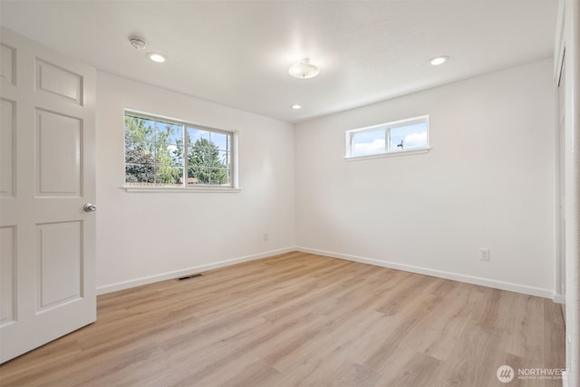 133 Bradley St, Walla Walla, WA 99362 - unfurnished bedroom with light wood finished floors, baseboards, and recessed lighting