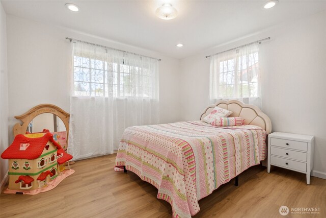 133 Bradley St, Walla Walla, WA 99362 - bedroom with wood finished floors and recessed lighting