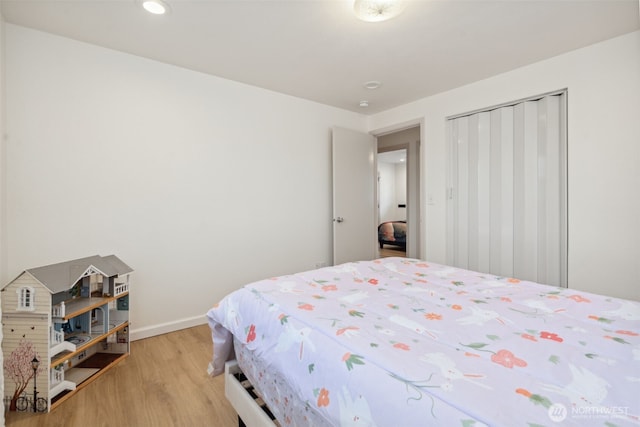 133 Bradley St, Walla Walla, WA 99362 - bedroom with light wood-style floors, baseboards, and recessed lighting