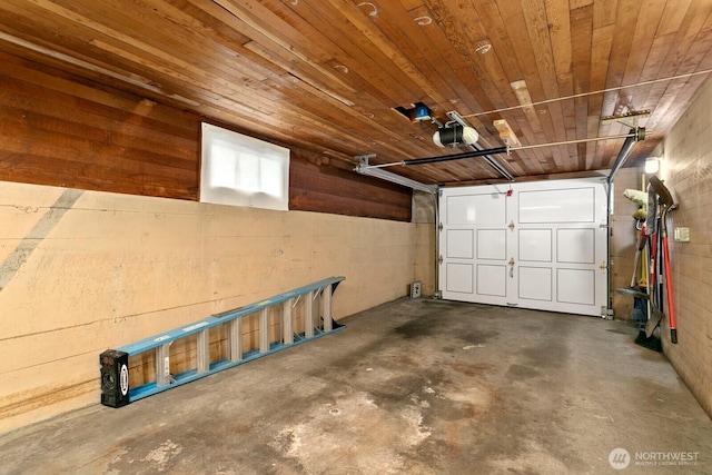 garage featuring a garage door opener