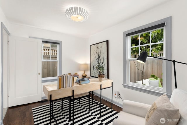 office featuring wood finished floors and baseboards