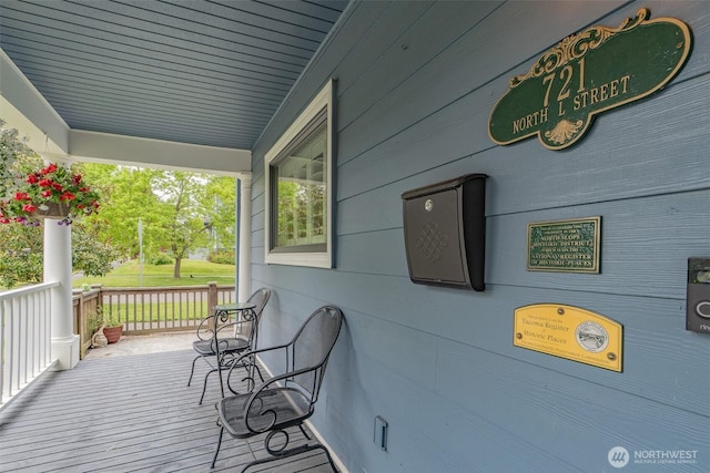 wooden deck featuring a porch