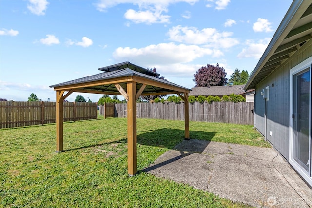 view of yard with a gazebo and a patio