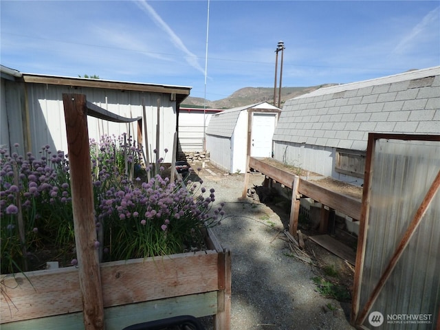 1061/2 Indian Ave E, Brewster, WA 98812 - view of patio featuring a mountain view