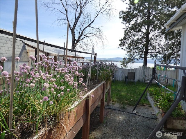 1061/2 Indian Ave E, Brewster, WA 98812 - fenced backyard featuring a water view