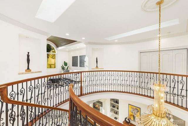 19516 67th Ave SE, Snohomish, WA 98296 - hallway with recessed lighting, a chandelier, an upstairs landing, and a skylight
