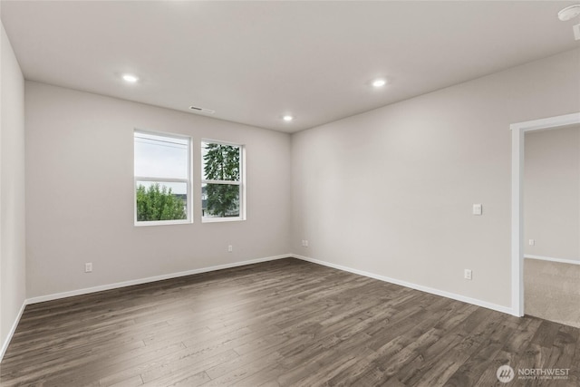 28307 74th Dr NW Unit 90, Stanwood, WA 98292 - unfurnished room featuring dark wood finished floors and recessed lighting