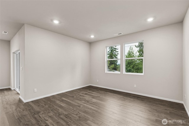 28307 74th Dr NW Unit 90, Stanwood, WA 98292 - empty room with dark wood-style floors and recessed lighting