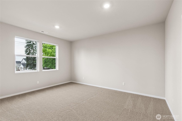 28307 74th Dr NW Unit 90, Stanwood, WA 98292 - carpeted spare room featuring recessed lighting