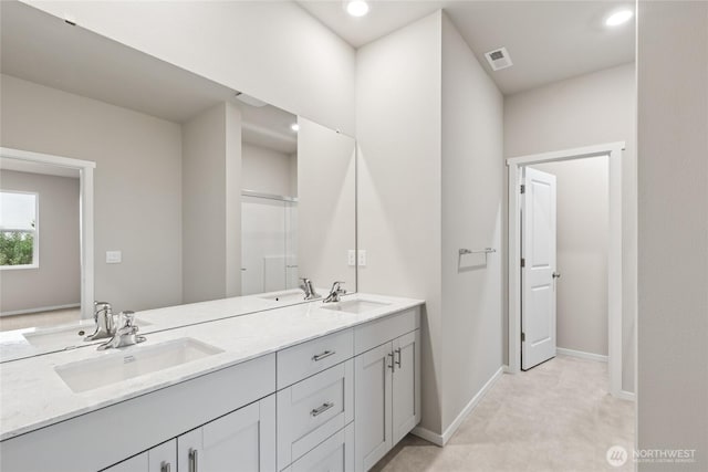 28307 74th Dr NW Unit 90, Stanwood, WA 98292 - bathroom with double vanity and recessed lighting