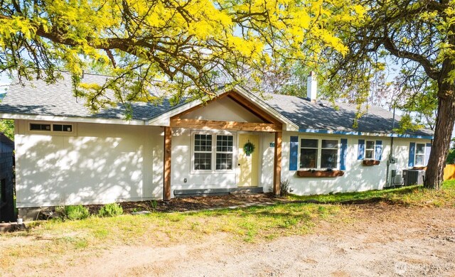 1803 Juniper St, Oroville, WA 98844 - single story home with central AC unit and a shingled roof