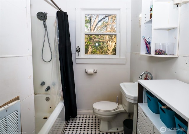 1803 Juniper St, Oroville, WA 98844 - bathroom with tile walls, toilet, vanity, shower / bath combo with shower curtain, and tile patterned floors