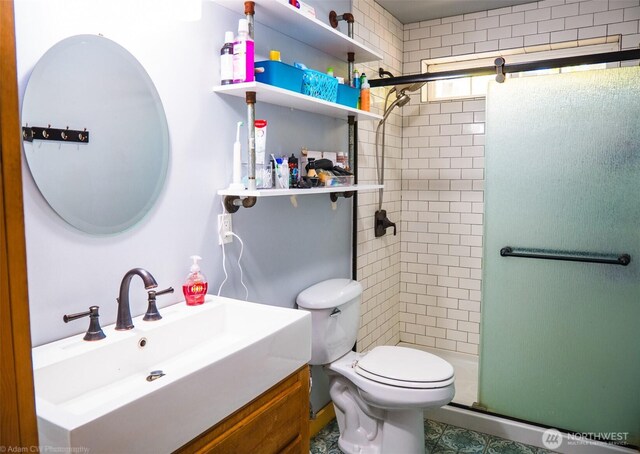 1803 Juniper St, Oroville, WA 98844 - bathroom featuring a shower stall, toilet, and vanity