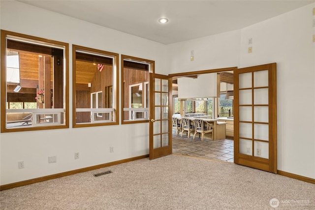 2262 Lambert Rd, Cle Elum, WA 98922 - carpeted empty room featuring french doors and baseboards