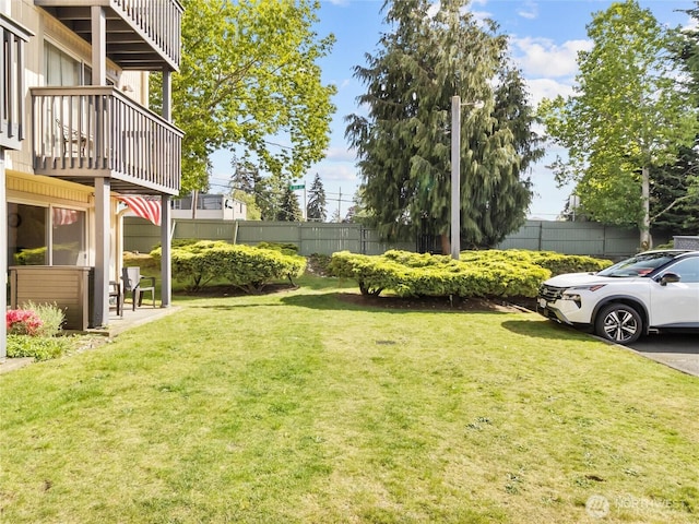31003 14th Ave S Unit H1, Federal Way, WA 98003 - view of yard with a balcony
