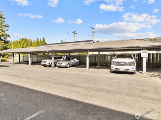 31003 14th Ave S Unit H1, Federal Way, WA 98003 - covered parking lot featuring fence