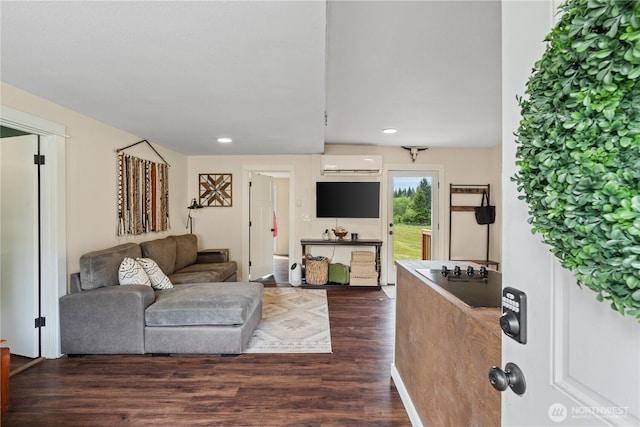 85 Rustemeyer Rd, Aberdeen, WA 98520 - living area featuring a wall mounted AC, dark wood-style flooring, and recessed lighting