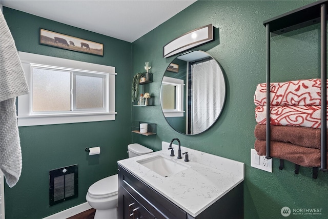 85 Rustemeyer Rd, Aberdeen, WA 98520 - bathroom with toilet, vanity, and wood finished floors
