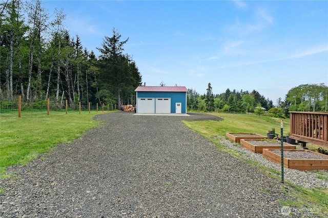 85 Rustemeyer Rd, Aberdeen, WA 98520 - detached garage featuring a vegetable garden
