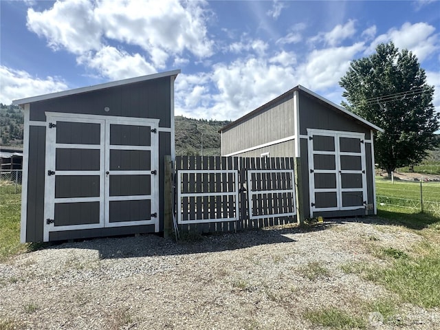 22 Rooster Flats Rd, Oroville, WA 98844 - view of shed featuring a gate and fence