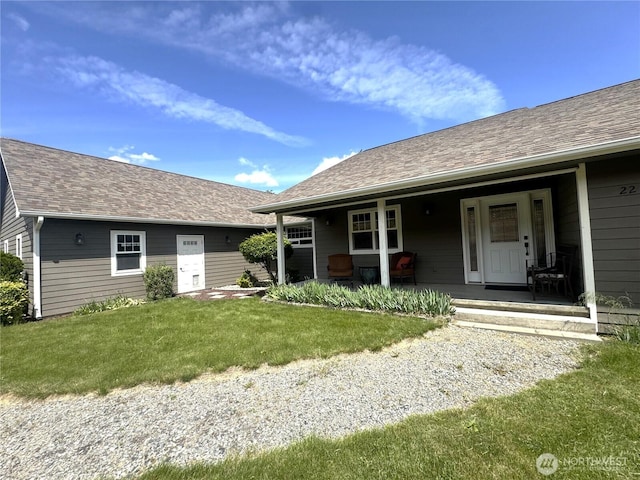 22 Rooster Flats Rd, Oroville, WA 98844 - view of front facade featuring a front yard, covered porch, and a shingled roof