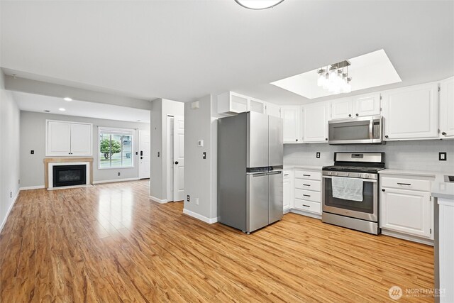3454 Deer Pointe Ct, Bellingham, WA 98226 - kitchen with stainless steel appliances, baseboards, light wood-type flooring, light countertops, and recessed lighting