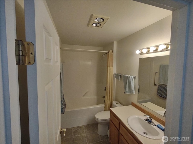 full bathroom with toilet, vanity, shower / tub combo with curtain, and tile patterned flooring