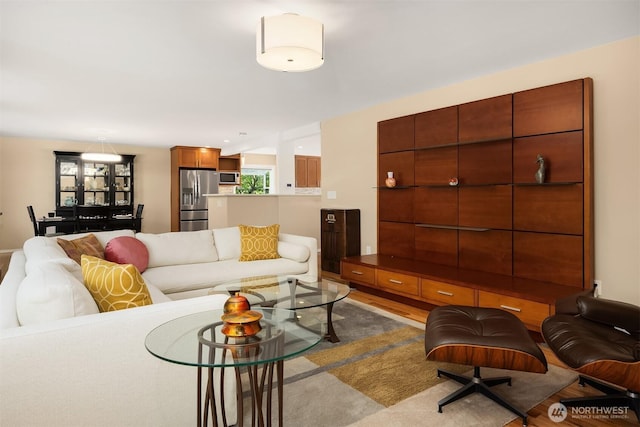 10504 Dixon Dr S, Seattle, WA 98178 - living room featuring wood finished floors