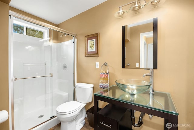 10504 Dixon Dr S, Seattle, WA 98178 - full bathroom with a sink, toilet, and a shower stall