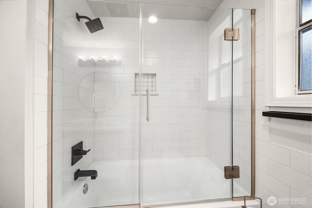 10504 Dixon Dr S, Seattle, WA 98178 - bathroom featuring combined bath / shower with glass door