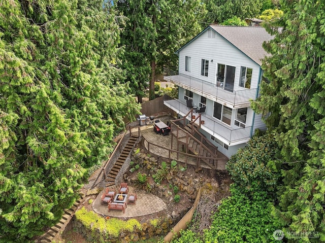 10504 Dixon Dr S, Seattle, WA 98178 - back of house with stairs, a balcony, and a patio