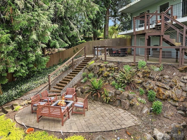10504 Dixon Dr S, Seattle, WA 98178 - view of yard featuring stairway, a fire pit, a patio, and a wooden deck
