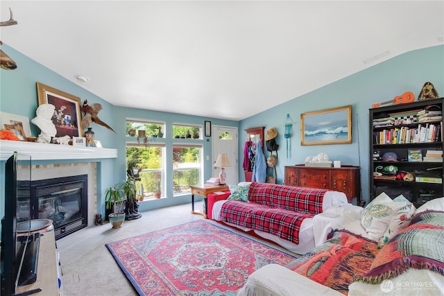 104 Jack Fir Ct, Packwood, WA 98361 - living room with carpet floors, vaulted ceiling, and a glass covered fireplace