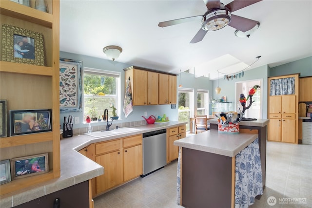 104 Jack Fir Ct, Packwood, WA 98361 - kitchen featuring stainless steel dishwasher, a sink, ceiling fan, light countertops, and vaulted ceiling