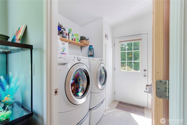 104 Jack Fir Ct, Packwood, WA 98361 - washroom featuring separate washer and dryer and light tile patterned floors