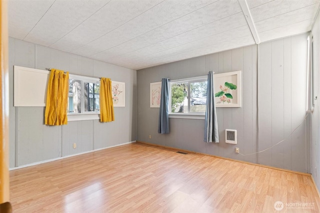 3213 85th St S Unit 48, Lakewood, WA 98499 - spare room with wood finished floors and heating unit
