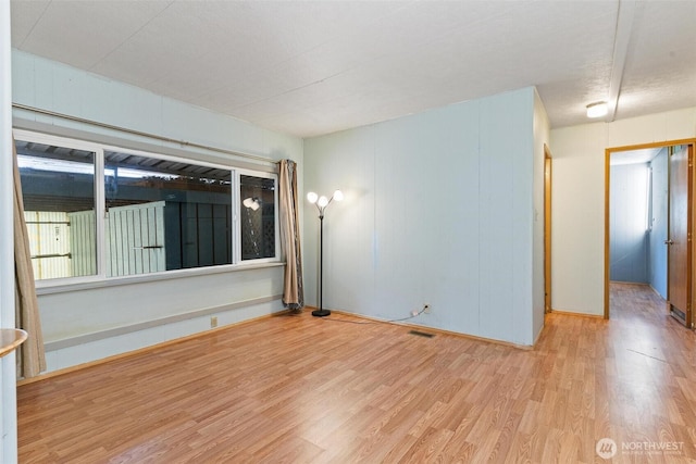 3213 85th St S Unit 48, Lakewood, WA 98499 - unfurnished room featuring wood finished floors and baseboards