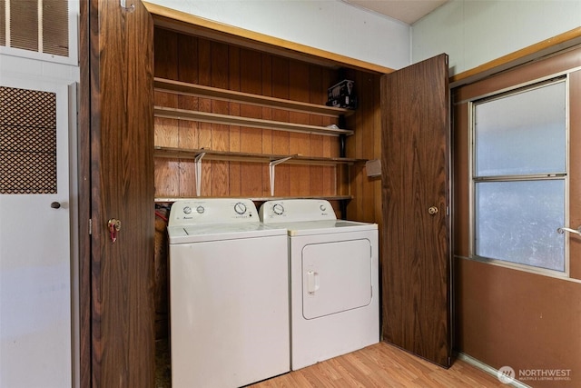 3213 85th St S Unit 48, Lakewood, WA 98499 - clothes washing area with washing machine and dryer and light wood-type flooring