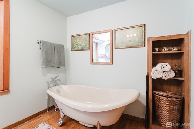 3246 Goshen Rd, Bellingham, WA 98226 - bathroom with a freestanding bath and wood finished floors
