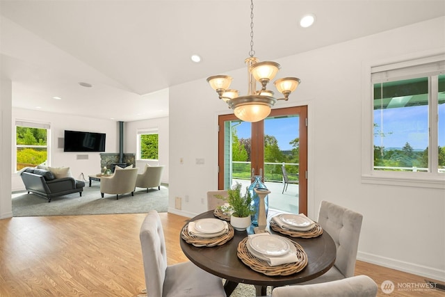 4415 Harborview Dr, Blaine, WA 98230 - dining room featuring a chandelier, plenty of natural light, recessed lighting, light wood-type flooring, and baseboards