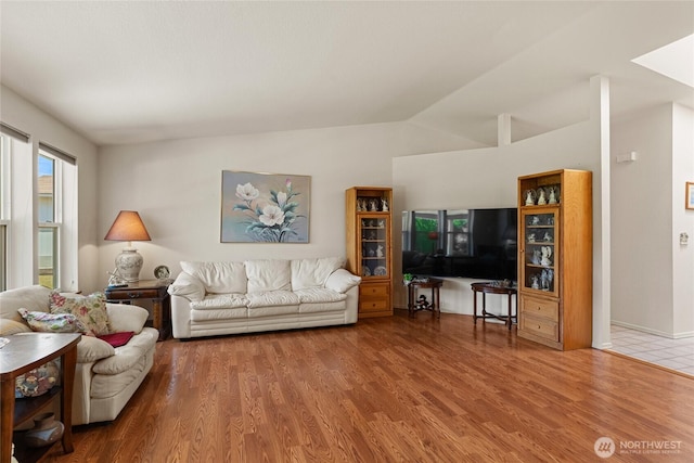 695 S Lyle Ave, East Wenatchee, WA 98802 - living room featuring wood finished floors and vaulted ceiling