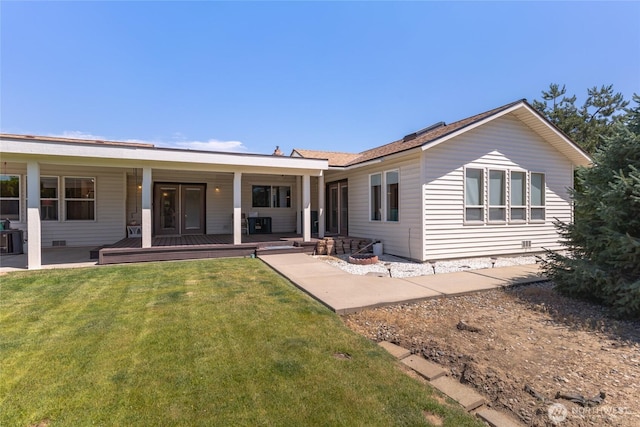 695 S Lyle Ave, East Wenatchee, WA 98802 - back of house featuring a lawn and a porch