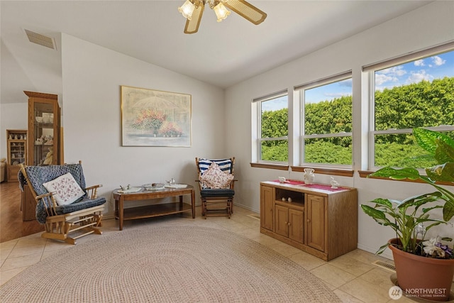 695 S Lyle Ave, East Wenatchee, WA 98802 - sitting room with vaulted ceiling, light tile patterned floors, and a ceiling fan