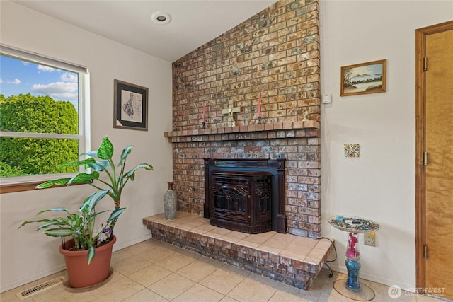 695 S Lyle Ave, East Wenatchee, WA 98802 - detailed view of baseboards and a brick fireplace