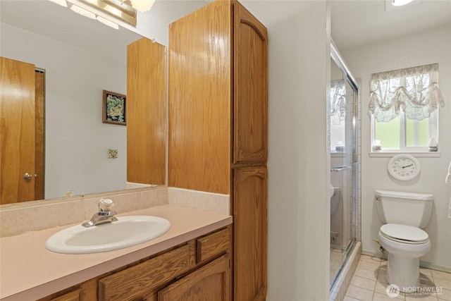 695 S Lyle Ave, East Wenatchee, WA 98802 - full bath with vanity, a stall shower, and tile patterned flooring