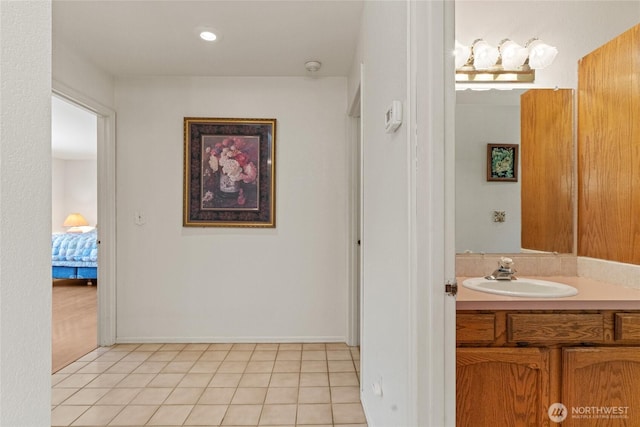 695 S Lyle Ave, East Wenatchee, WA 98802 - bathroom with vanity, tile patterned flooring, and connected bathroom